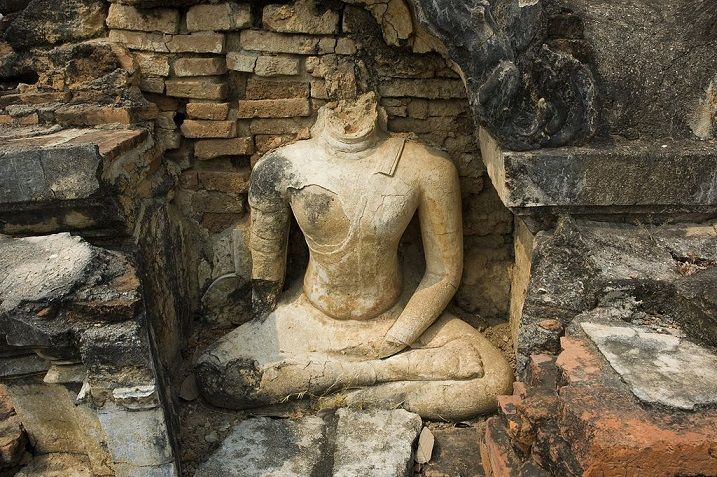 Headless Buddha statue.
