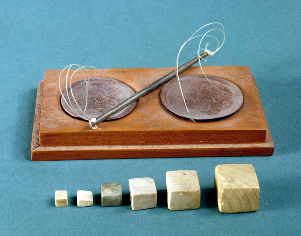 Indus traders weighed their goods on scales, using stone weights. The scale pans here are made of copper.